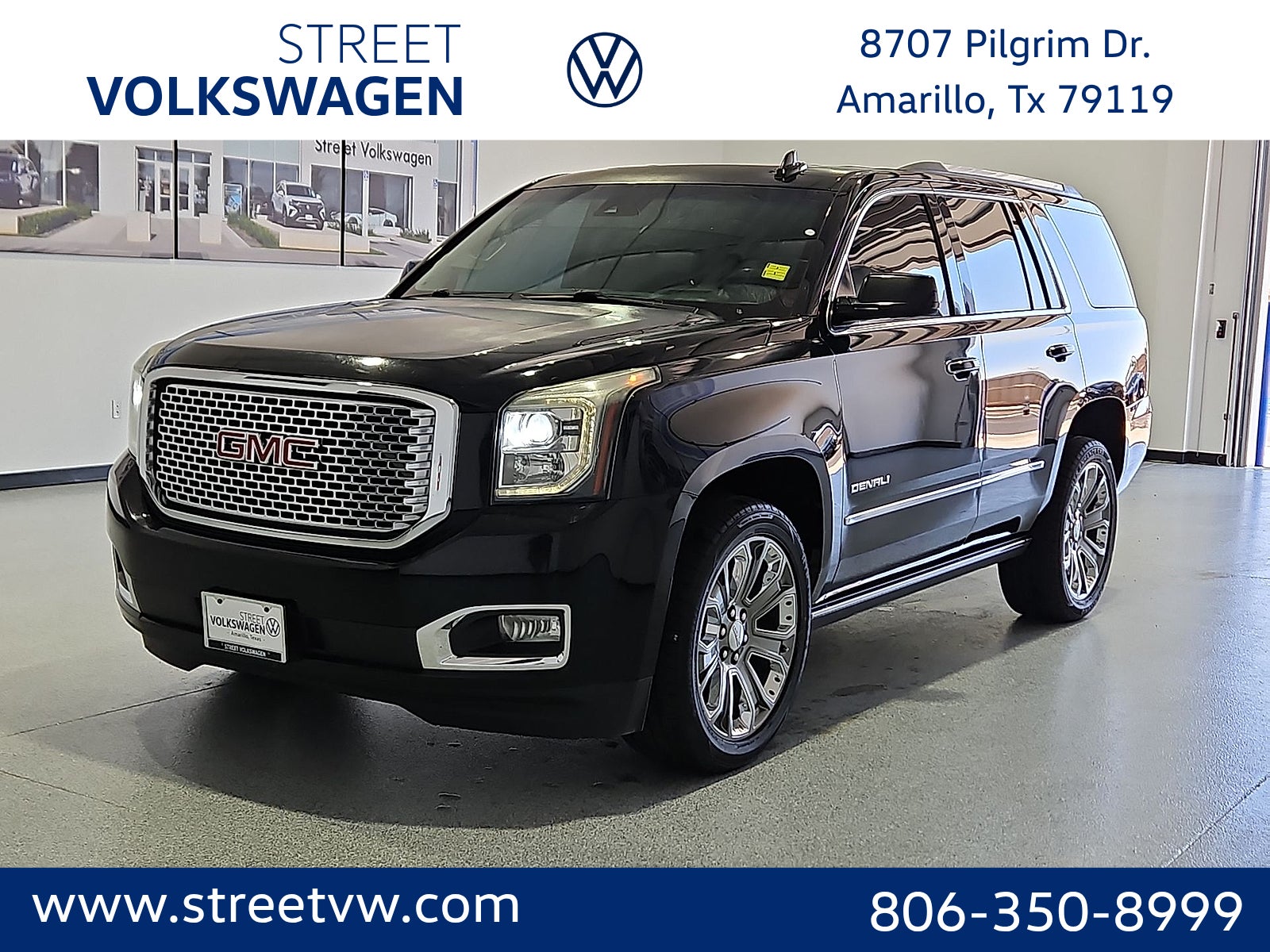 2015 GMC Yukon Denali in Onyx Black — front three-quarter view