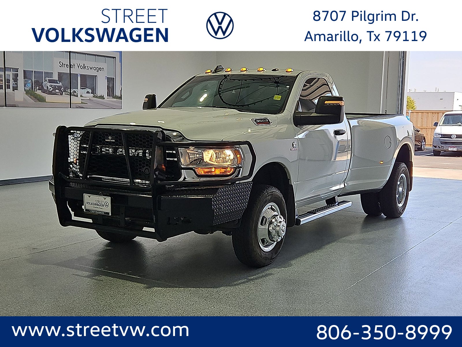 2023 RAM 3500 Tradesman Regular Cab 4x4 8' Box in Bright White Clearcoat — front three-quarter view