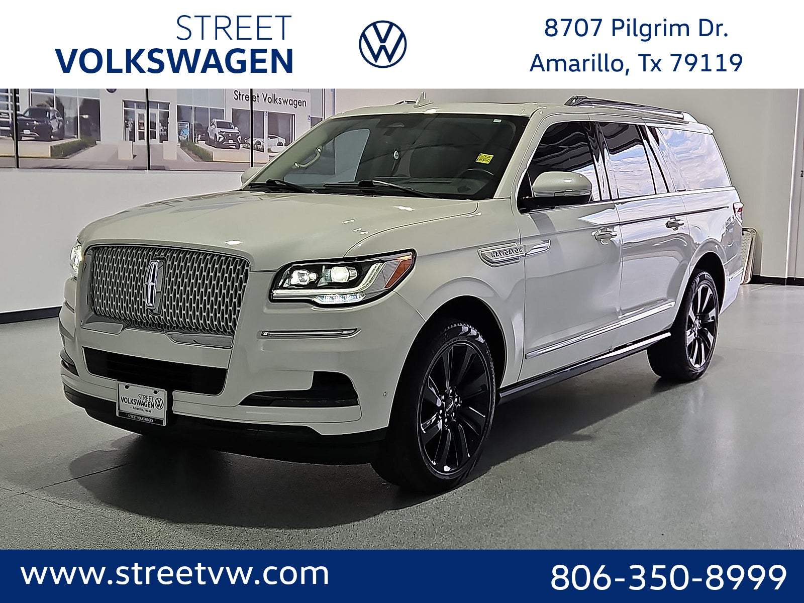 2024 Lincoln Navigator Reserve L in White Metallic — front three-quarter view